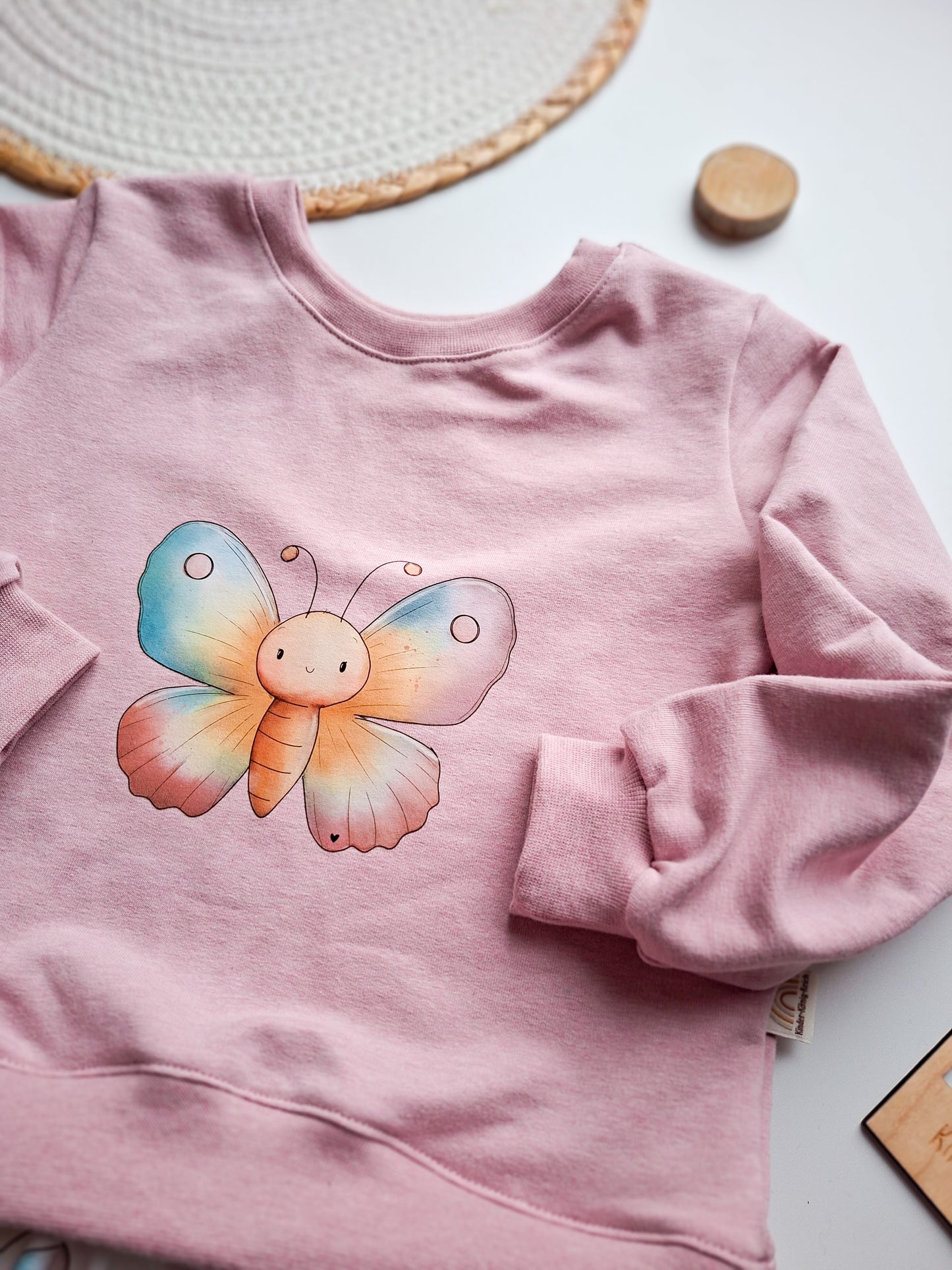 Herzchen Sweater "Schmetterling" Gr. 104